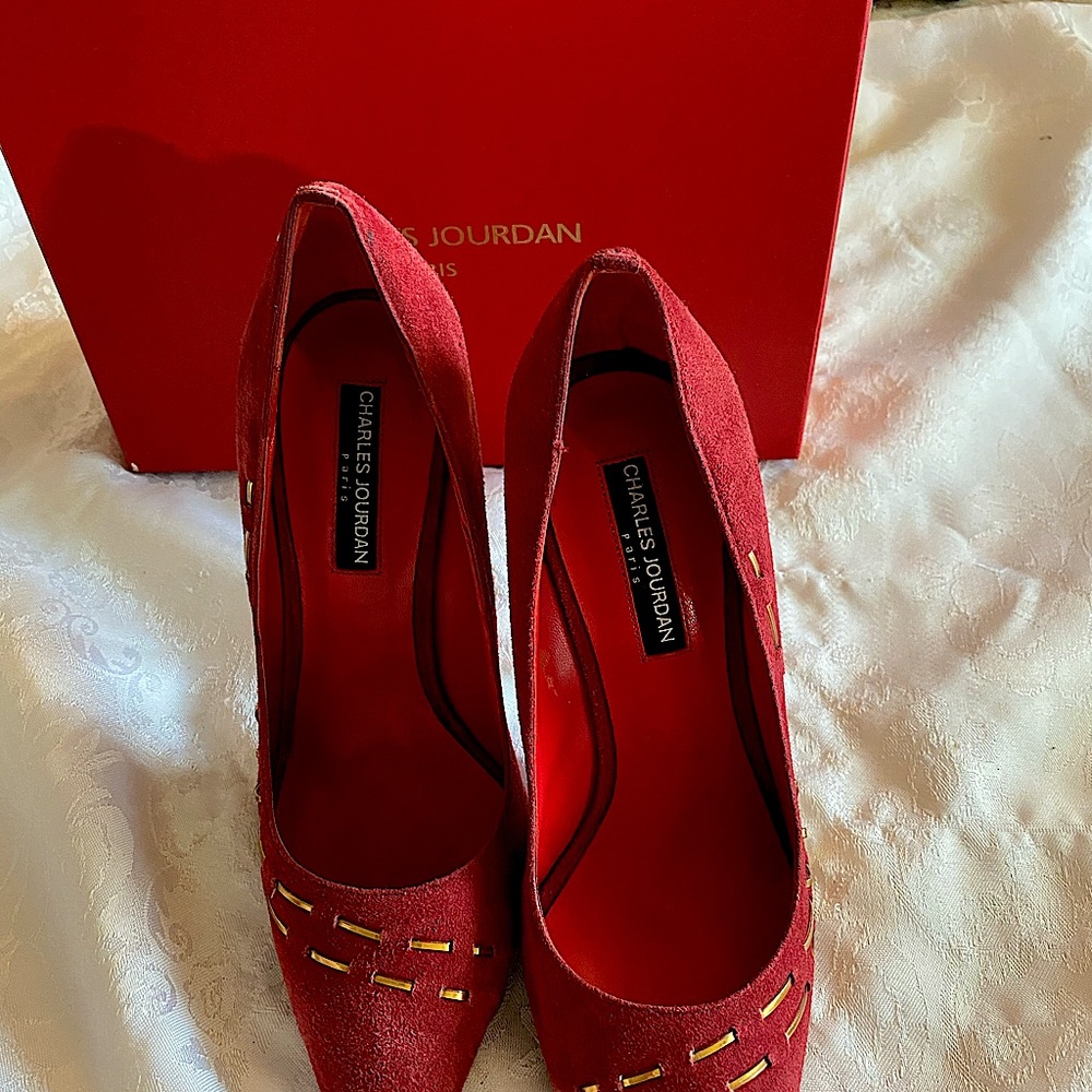 Brand new, never worn, with box. Size 8M.